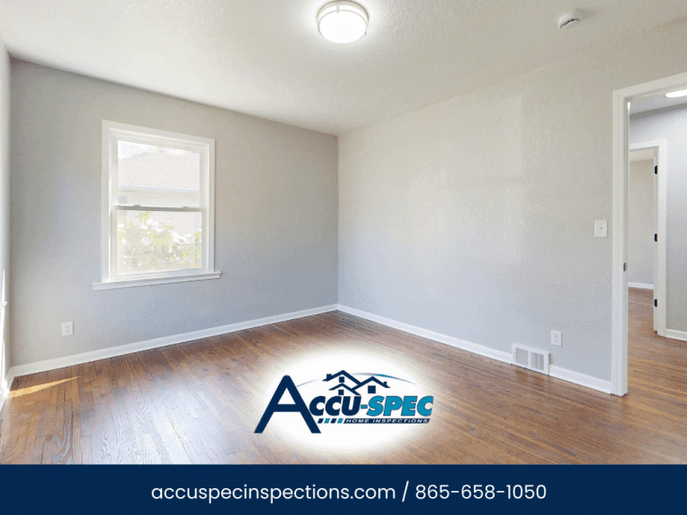 Home inspector examining floor structure in Gatlinburg cabin